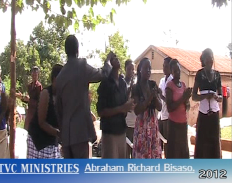 PRAYING UNDER THE MANGO TREE